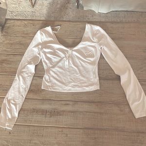 White lulu lemon long sleeve fitted shirt.